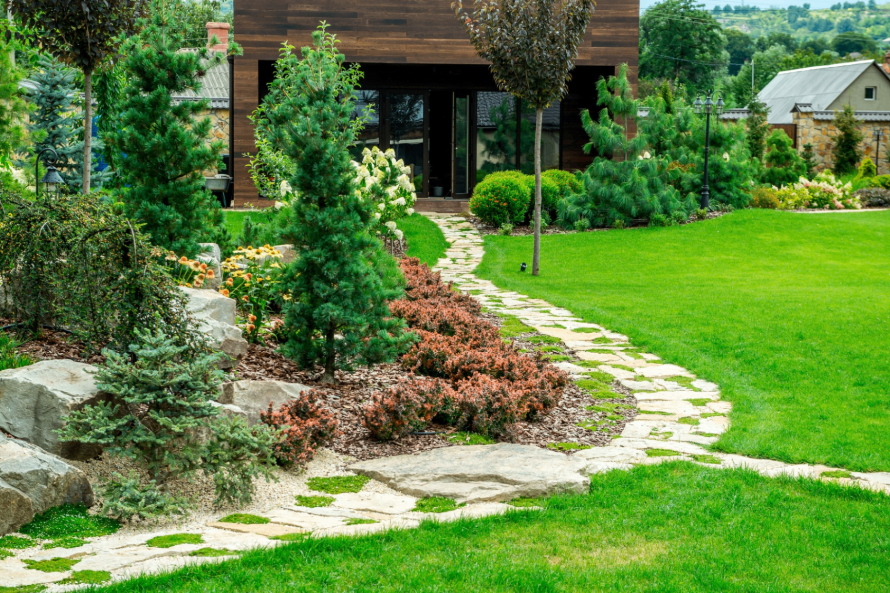Landscaped front garden with lawn and pathway